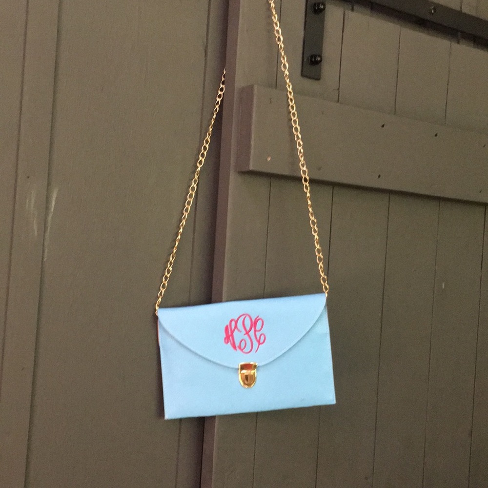 Blue cross body purse initials